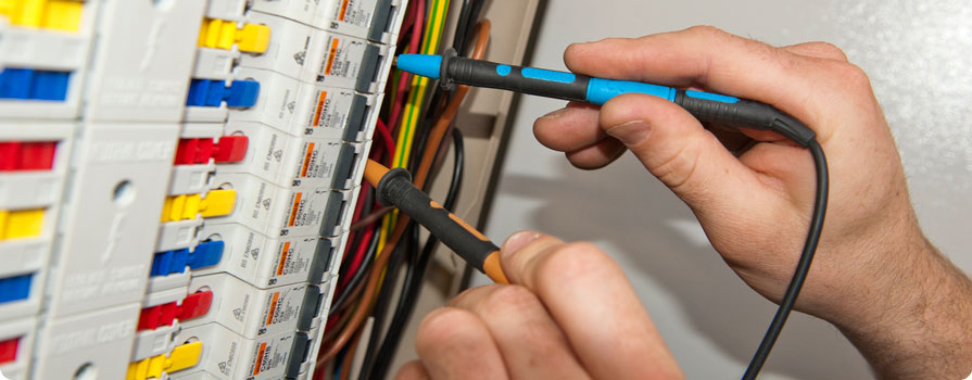 electrician testing a DB board