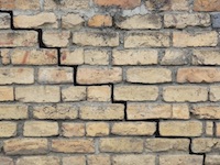 Cracked brick wall