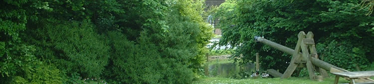 The ducking stool at the end of the pub garden