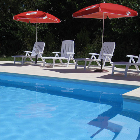 Relax by the heated swimming pool